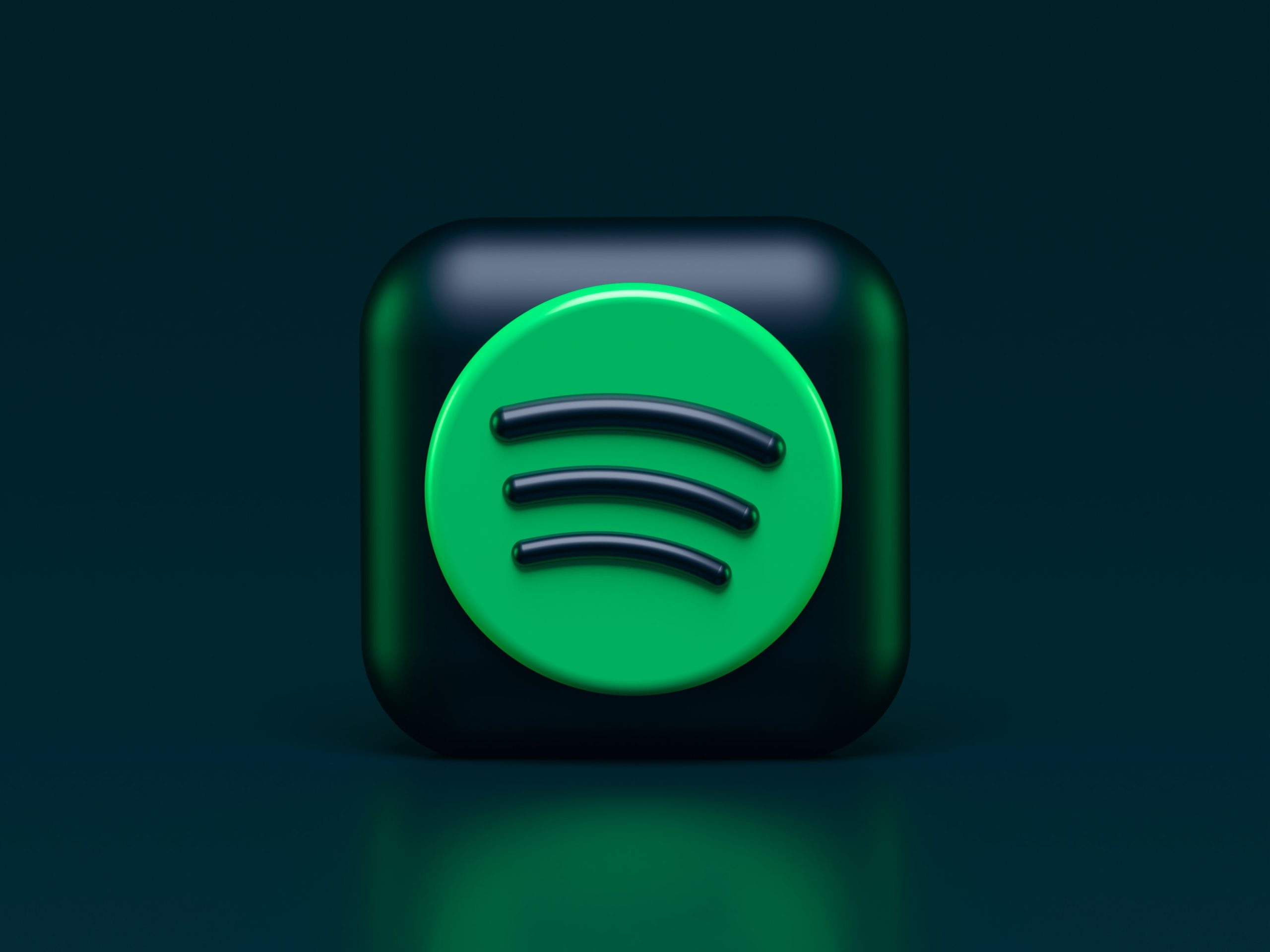 Spotify Logo auf einem schwarzen Wuerfel
