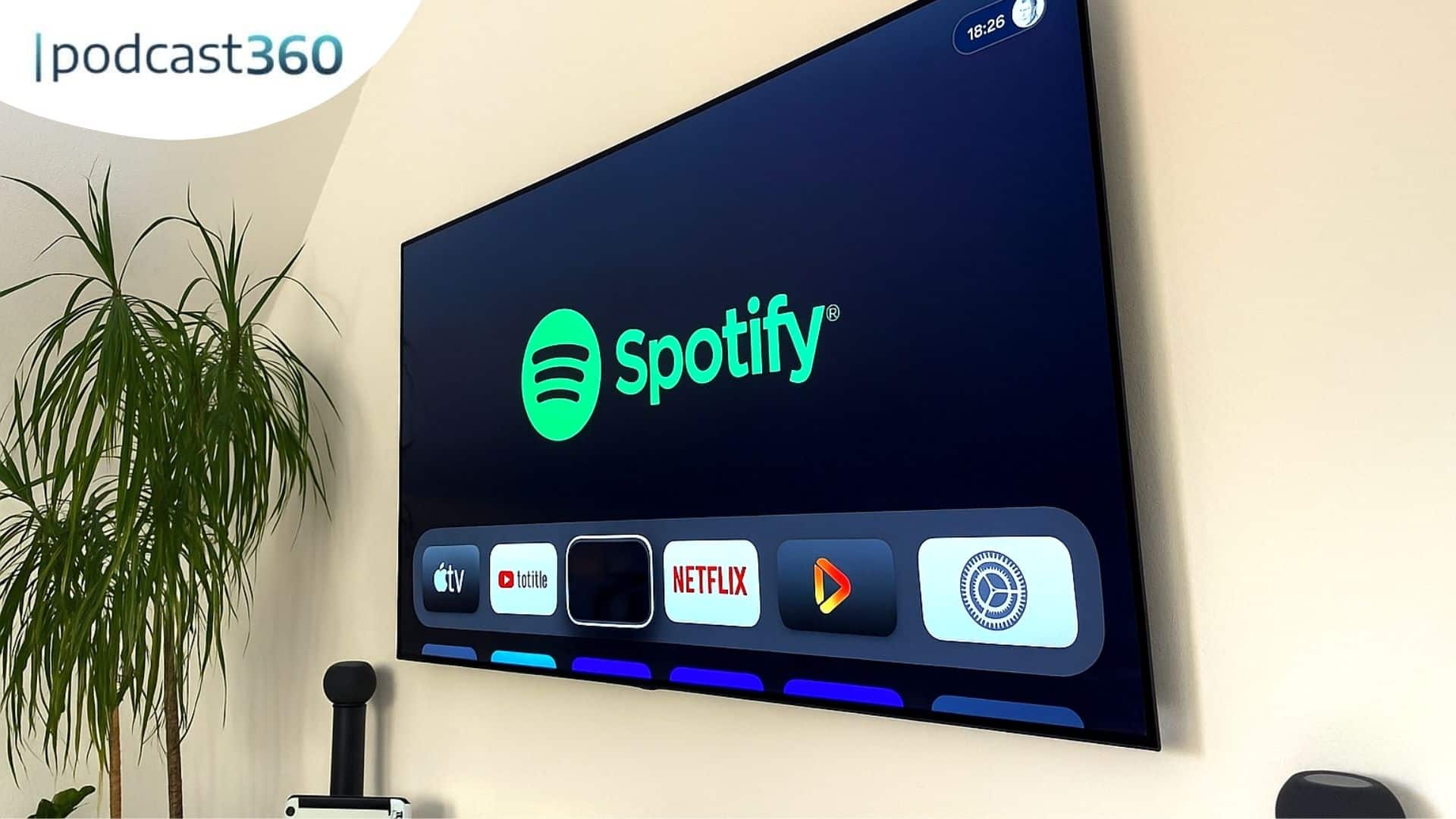 Auf einem Fernsehbildschirm wird die Spotify-App angezeigt, andere Streaming-Apps sind im Home-Menü darunter zu sehen.